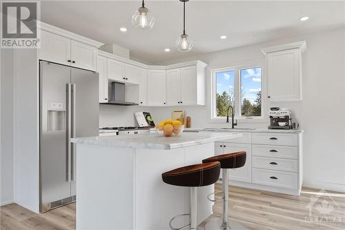 This photo has been virtually staged - 807 Pine Grove Road, Lanark Highlands, ON - Indoor Photo Showing Kitchen