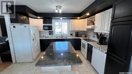5703 Nelson Beach Drive, Wakaw Lake, SK - Indoor Photo Showing Kitchen With Double Sink