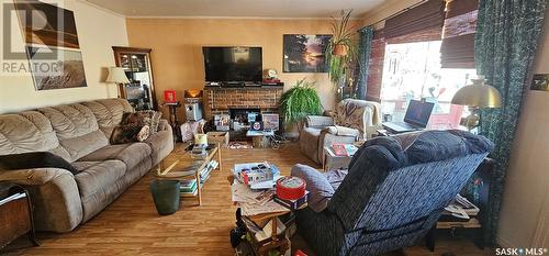 312 Brownlee Street, Herbert, SK - Indoor Photo Showing Living Room With Fireplace