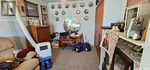 312 Brownlee Street, Herbert, SK - Indoor Photo Showing Other Room With Fireplace