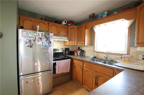 647 Bignell Avenue, The Pas, MB - Indoor Photo Showing Kitchen With Double Sink