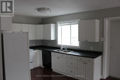 #4 -12637 Tenth Line, Whitchurch-Stouffville, ON - Indoor Photo Showing Kitchen With Double Sink