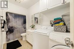 Main floor bath with laundry - 