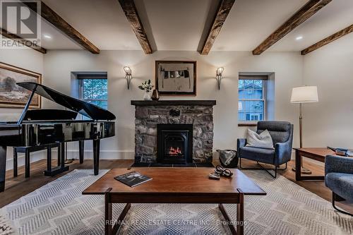 75 Chalmers Street, Centre Wellington, ON - Indoor Photo Showing Living Room With Fireplace