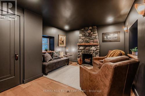 75 Chalmers Street, Centre Wellington, ON - Indoor With Fireplace
