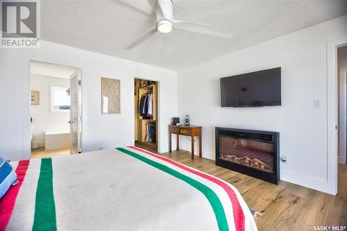 43 Hadley Road, Prince Albert, SK - Indoor Photo Showing Bedroom With Fireplace