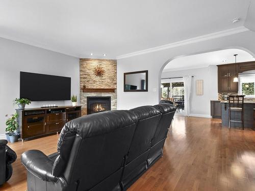 Living room - 3175 Rue De La Licorne, Terrebonne (Terrebonne), QC - Indoor Photo Showing Living Room With Fireplace