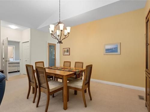 1451 Seaway Dr, Parksville, BC - Indoor Photo Showing Dining Room With Fireplace