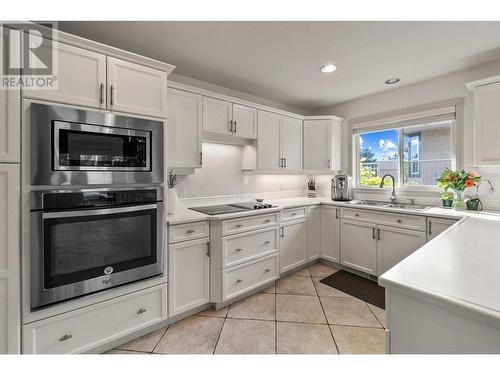 3941 Gallaghers Circle, Kelowna, BC - Indoor Photo Showing Kitchen With Double Sink