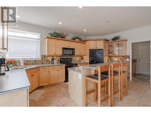 5214 Riverside Drive, Fairmont Hot Springs, BC - Indoor Photo Showing Kitchen With Double Sink