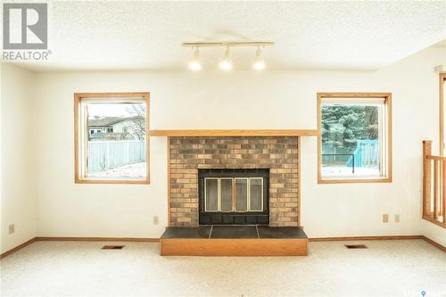 326 Jan Crescent, Saskatoon, SK - Indoor Photo Showing Living Room With Fireplace