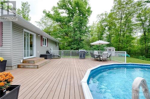1118 Francis Street, Calabogie, ON - Outdoor With Above Ground Pool With Deck Patio Veranda
