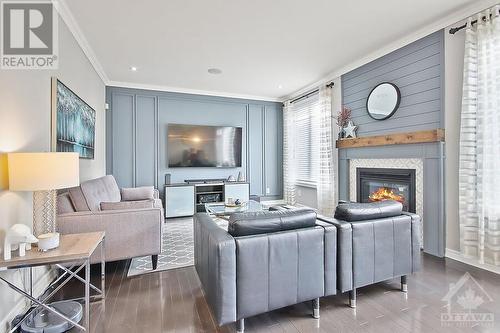 160 Whernside Terrace, Ottawa, ON - Indoor Photo Showing Living Room With Fireplace