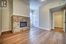 201 - 1614 Ridge Road E, Oro-Medonte, ON  - Indoor With Fireplace 