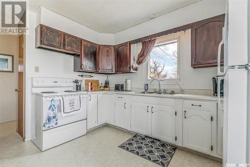 116 Bates Street, Earl Grey, SK - Indoor Photo Showing Kitchen With Double Sink