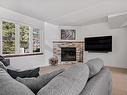 Salon - 1752 Ch. Du Golf, Mont-Tremblant, QC  - Indoor Photo Showing Living Room With Fireplace 