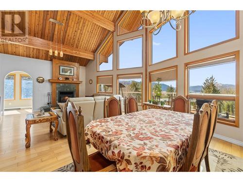 3318 Mcbride Road, Blind Bay, BC - Indoor Photo Showing Dining Room With Fireplace