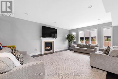 6268 Disputed Rd, Lasalle, ON - Indoor Photo Showing Living Room With Fireplace