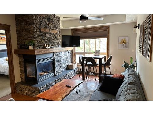 2204 - 7495 Columbia Avenue, Radium Hot Springs, BC - Indoor Photo Showing Living Room With Fireplace
