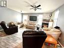 40 Marine Drive, Saskatchewan Landing, SK  - Indoor Photo Showing Living Room With Fireplace 