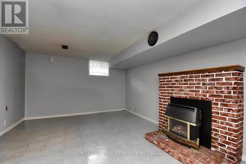 32 Arno St, Hamilton, ON - Indoor With Fireplace