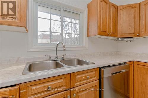 18 Greenlaw Plwy S, St. Catharines, ON - Indoor Photo Showing Kitchen With Double Sink