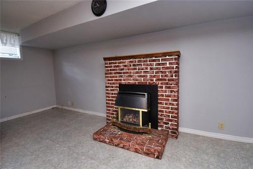 32 Arno Street, Hamilton, ON - Indoor With Fireplace