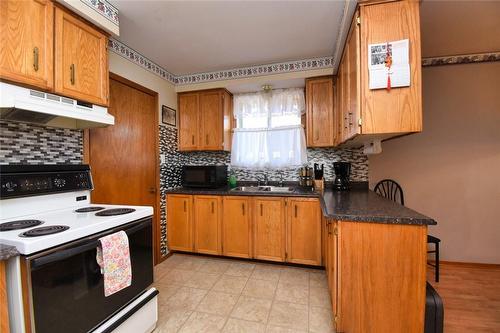 32 Arno Street, Hamilton, ON - Indoor Photo Showing Kitchen With Double Sink
