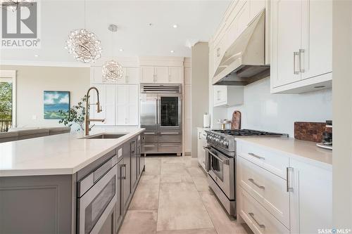 103 404 Cartwright Street, Saskatoon, SK - Indoor Photo Showing Kitchen With Upgraded Kitchen