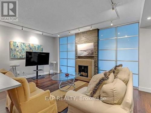 #2822 -25 The Esplanade, Toronto, ON - Indoor Photo Showing Living Room With Fireplace