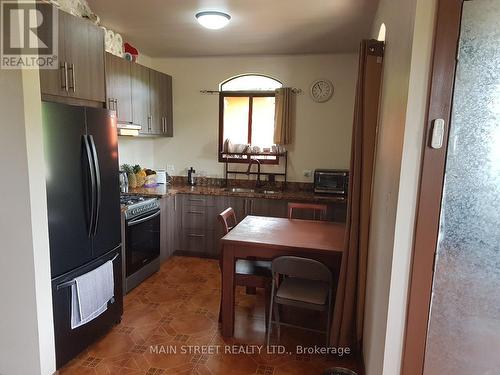 1 Puntarenas-Golfito Street, Costa Rica, ON - Indoor Photo Showing Kitchen