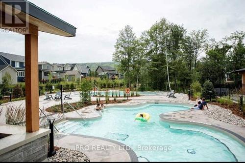 150 Sycamore Street, Blue Mountains, ON - Outdoor With In Ground Pool With Backyard