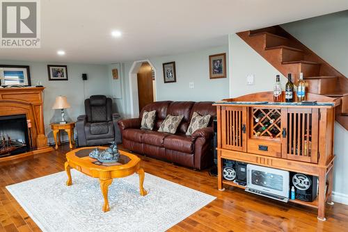 3 Jacob'S Lane, Fogo Island (Joe Batts Arm), NL - Indoor Photo Showing Living Room With Fireplace