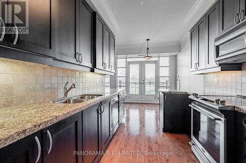 507 - 9 Burnhamthorpe Crescent, Toronto, ON - Indoor Photo Showing Kitchen With Double Sink With Upgraded Kitchen