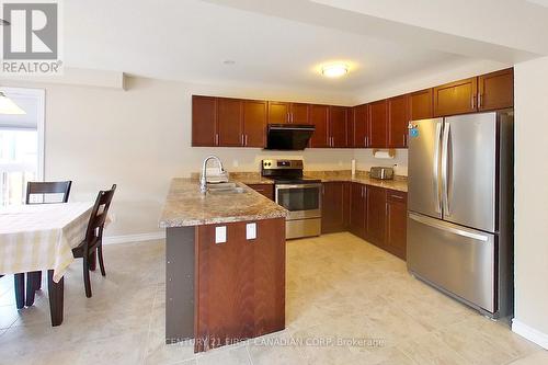 #1 -910 Reeves Ave, London, ON - Indoor Photo Showing Kitchen With Double Sink
