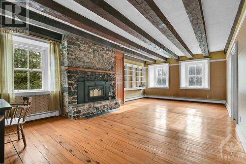 4579 Whittaker Road, Williamsburg, ON - Indoor With Fireplace