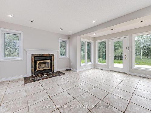 Innisfil, ON - Indoor Photo Showing Living Room With Fireplace