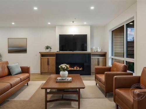 119-463 Hirst Ave, Parksville, BC - Indoor Photo Showing Living Room With Fireplace