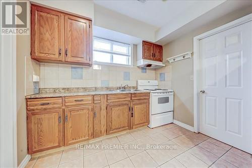 3525 Line 10, Bradford West Gwillimbury, ON - Indoor Photo Showing Kitchen With Double Sink