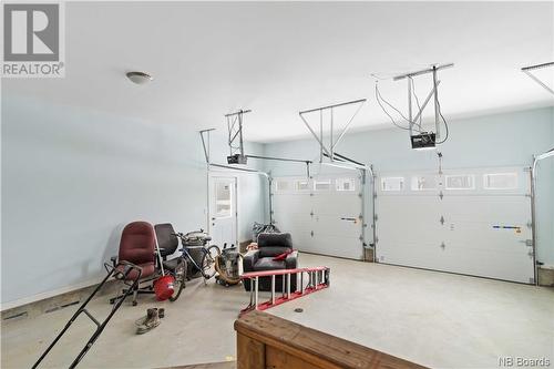 52 Kimberley Street, New Maryland, NB - Indoor Photo Showing Garage