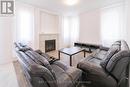 #Upper -7853 Seabiscuit Dr, Niagara Falls, ON  - Indoor Photo Showing Living Room With Fireplace 