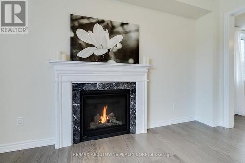 7 Ford St, Brant, ON - Indoor Photo Showing Living Room With Fireplace