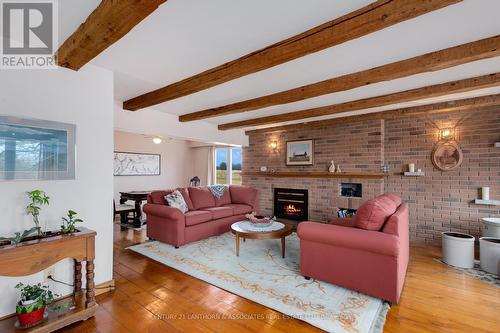 338 Cold Creek Road, Prince Edward County, ON - Indoor Photo Showing Living Room With Fireplace