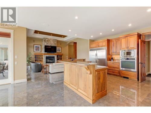 3137 Pinot Noir Place, West Kelowna, BC - Indoor Photo Showing Kitchen With Fireplace