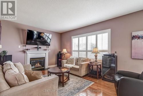 6 Collingwood Ave, Brampton, ON - Indoor Photo Showing Living Room With Fireplace