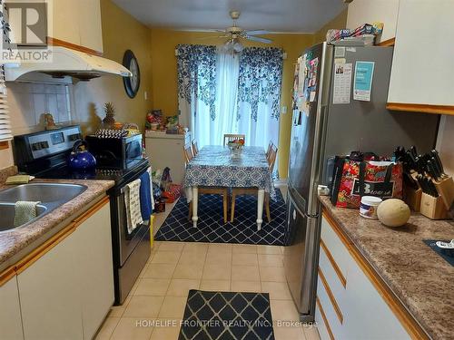 22 Reidmount Ave, Toronto, ON - Indoor Photo Showing Kitchen With Double Sink