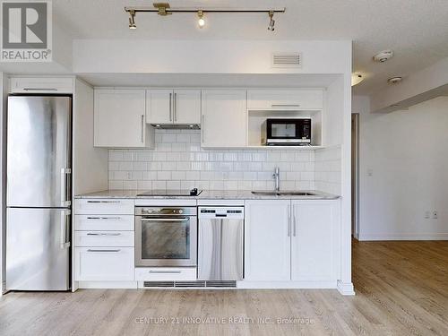 #1223 -275 Village Green Sq, Toronto, ON - Indoor Photo Showing Kitchen With Upgraded Kitchen