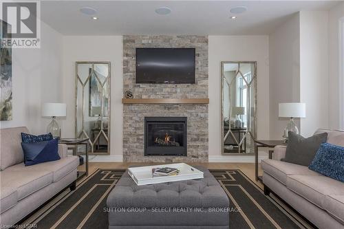 142 Harvest Lane, Thames Centre, ON - Indoor Photo Showing Living Room With Fireplace