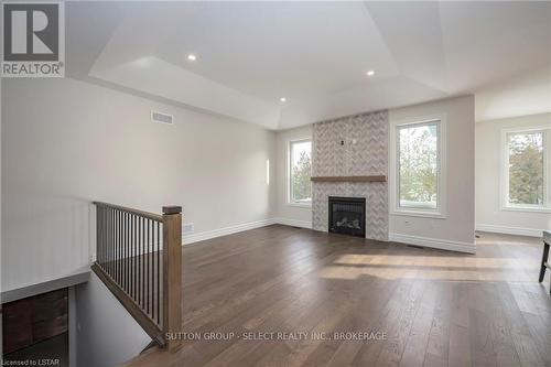 61 Arrowwood Path, Middlesex Centre, ON - Indoor Photo Showing Living Room With Fireplace
