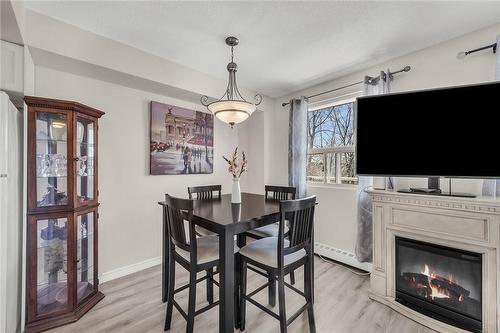 793 Colborne Street|Unit #217, Brantford, ON - Indoor Photo Showing Dining Room With Fireplace